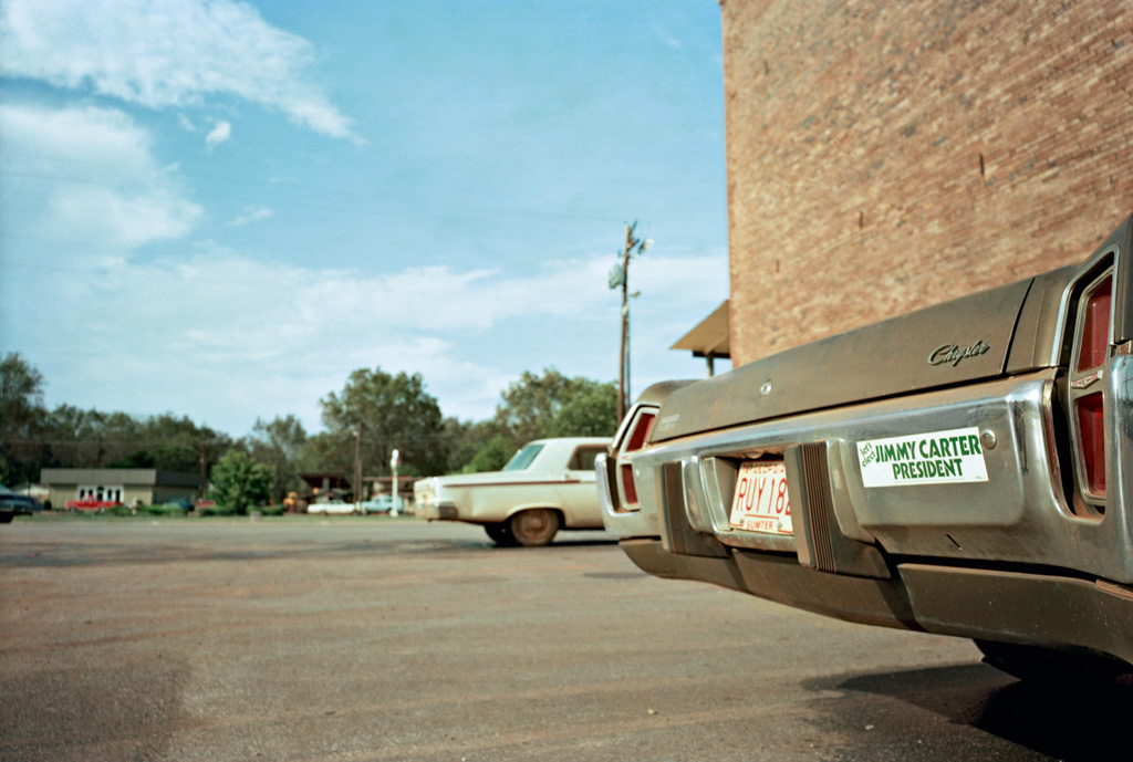 William Eggleston, Election Eve, 63. bank parking lot, Plains,
19 Sumter, © 2017 Eggleston Artistic Trust, Book published by Steidl 2017